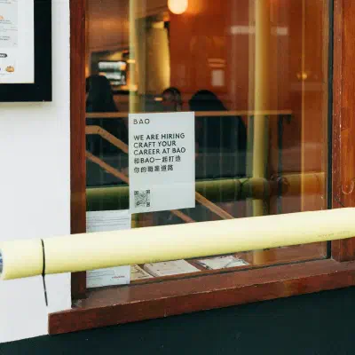 Picture QR code showcase: qr code with logo on a restaurant window looking for employees